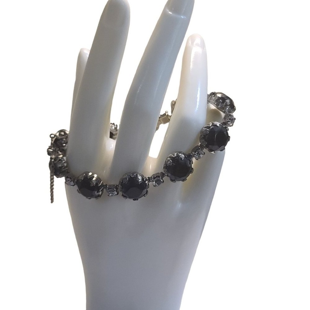 Schiaparelli Black Rhinestone Bracelet with safety chain one missing stone